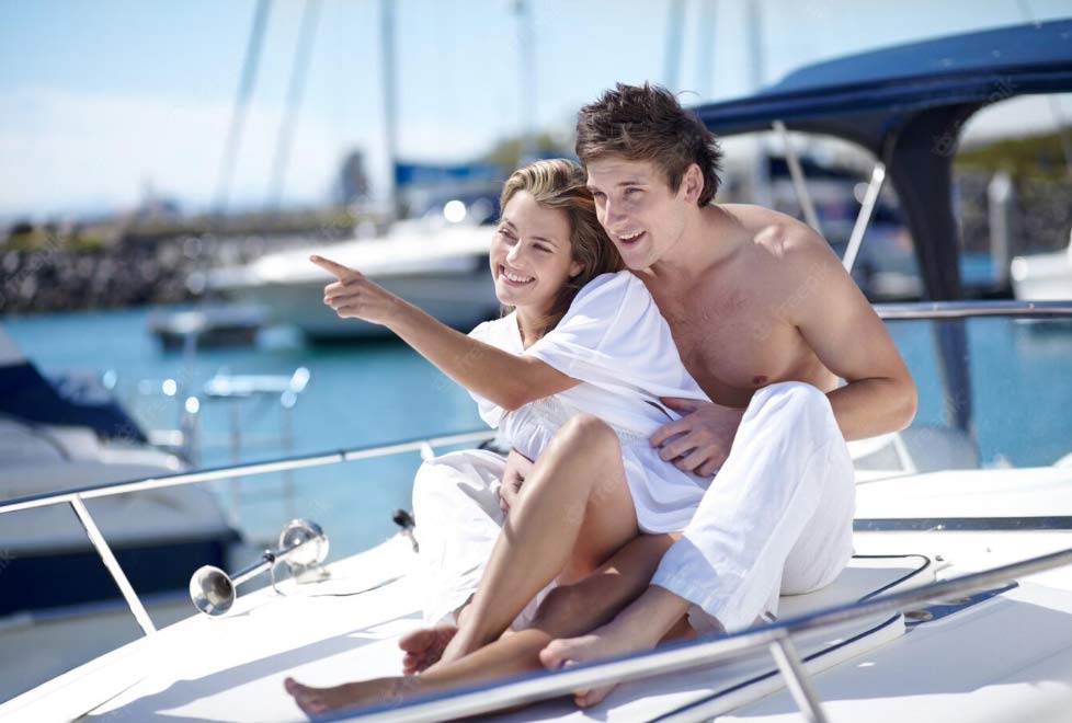 Dating on a yacht, couple having fun