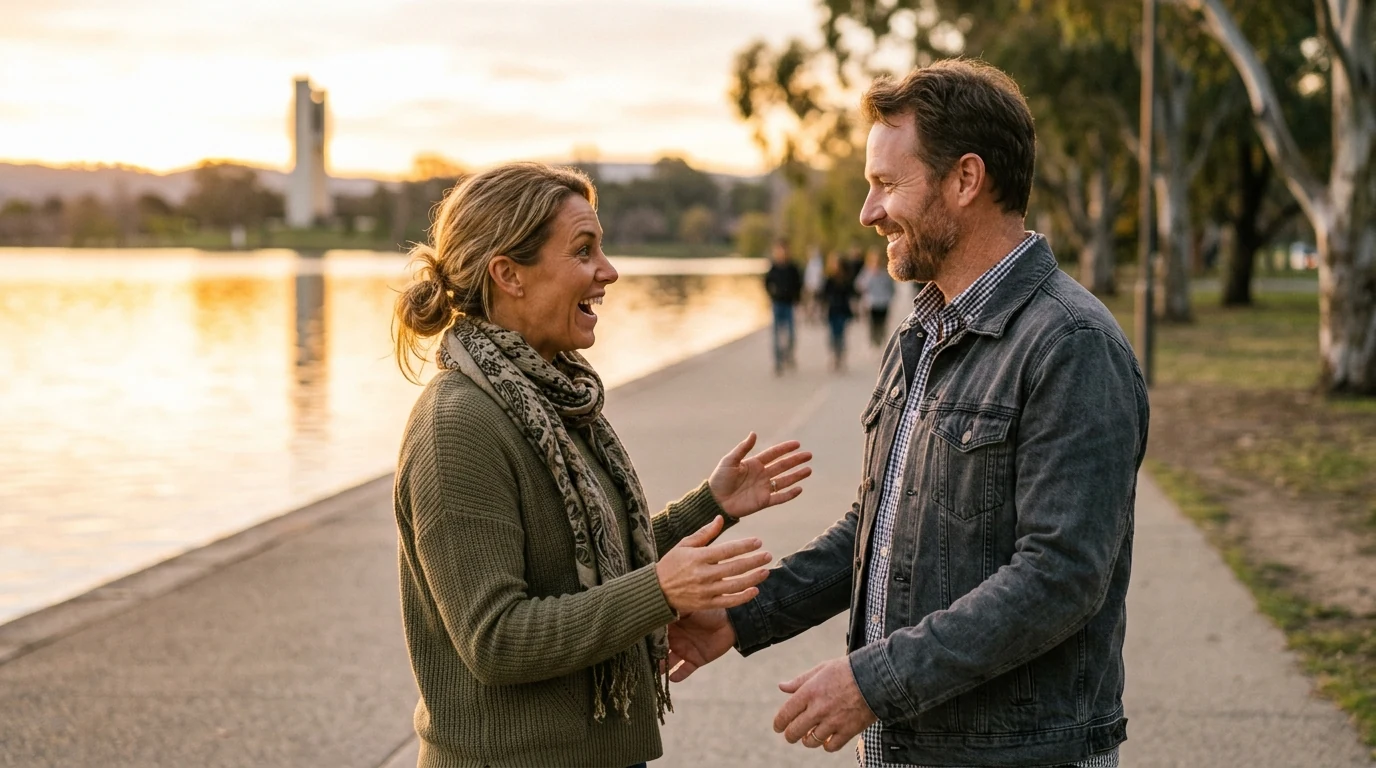Couple sharing food on a date on the path around Lake Burley Griffin in Canberra at golden hour