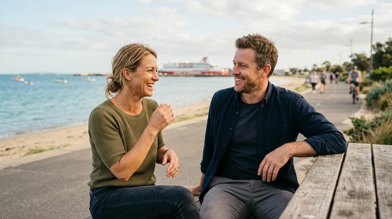 Couple enjoying a relaxed first date on a bayside path at Port Melbourne in Melbourne on a mild day